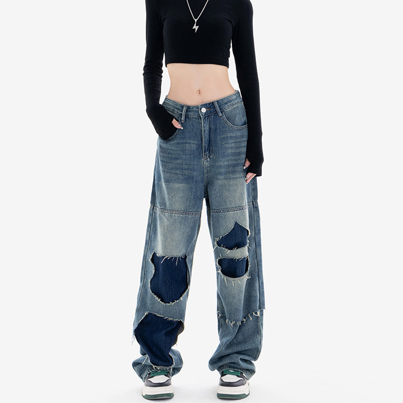 Podarte, luŸne jeansy