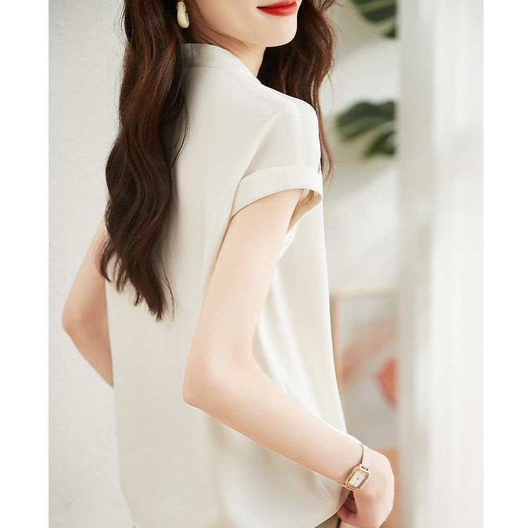 Koszula bez rękawów z dekoltem w serek w kolorze beżowym