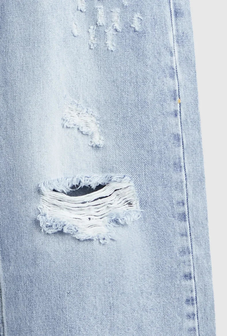 Przetarte jeansy slim fit