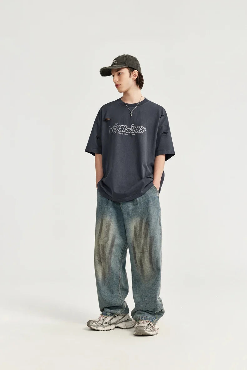 T-shirt oversize z dziurami i dziurami, haftowany