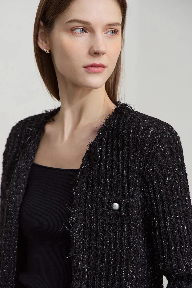 Minimalistyczny kardigan z frędzlami