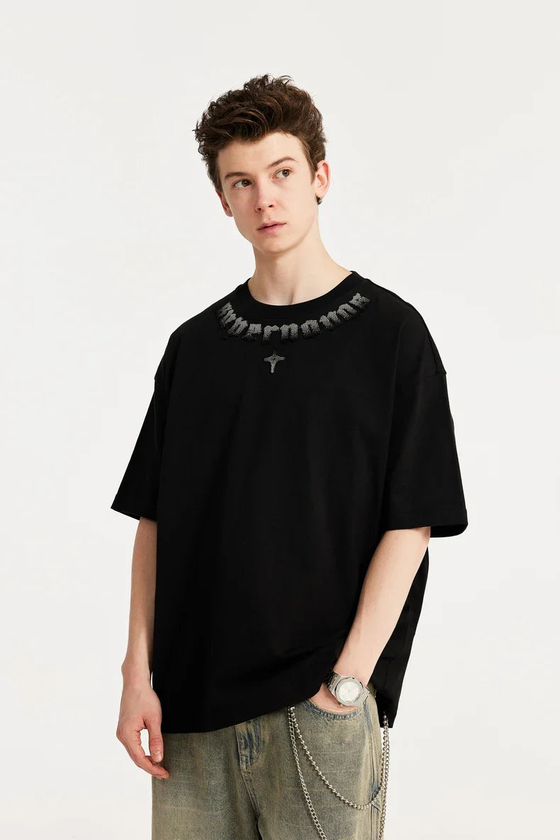 T-shirt oversize z haftem szenilowym