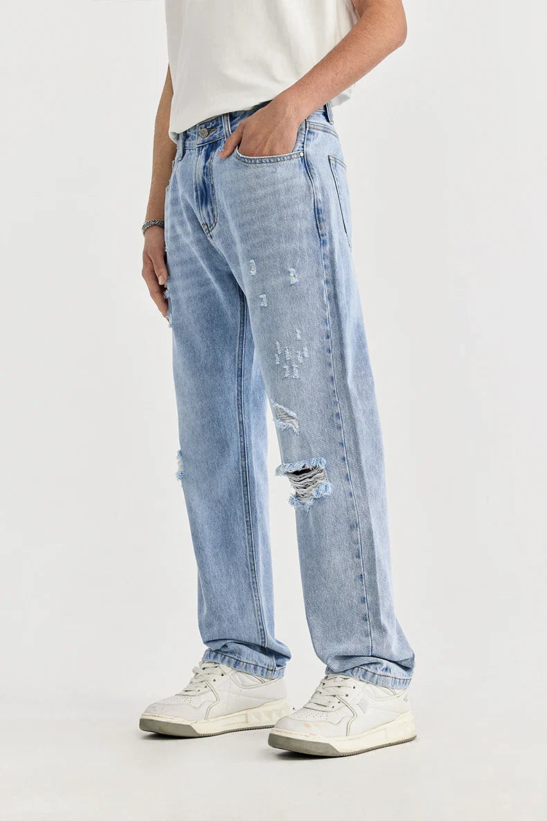 Przetarte jeansy slim fit