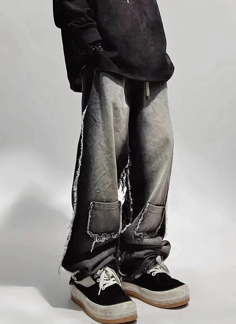 Czarne jeansy typu oversize z dziurami