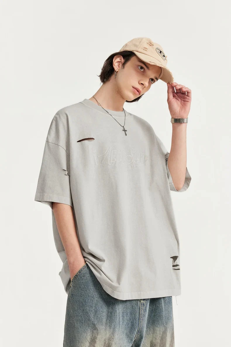 T-shirt oversize z dziurami i dziurami, haftowany