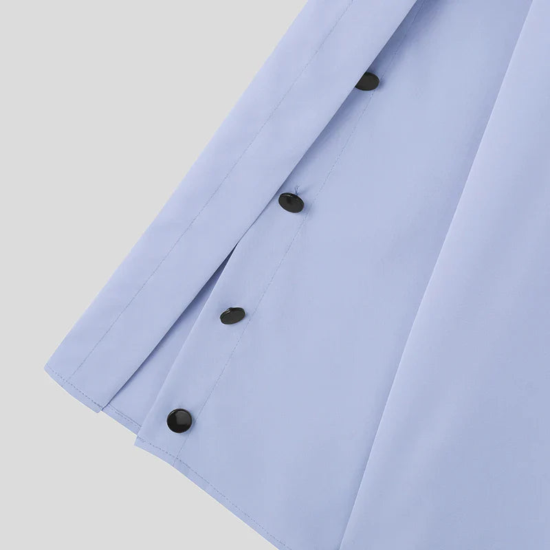 LuŸna koszula z rozciêciem na klapie, dęugim rêkawem i guzikami