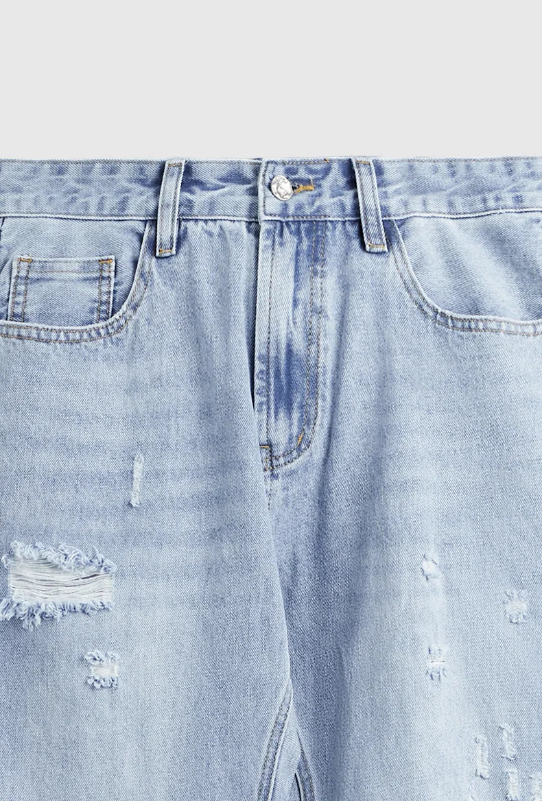Przetarte jeansy slim fit