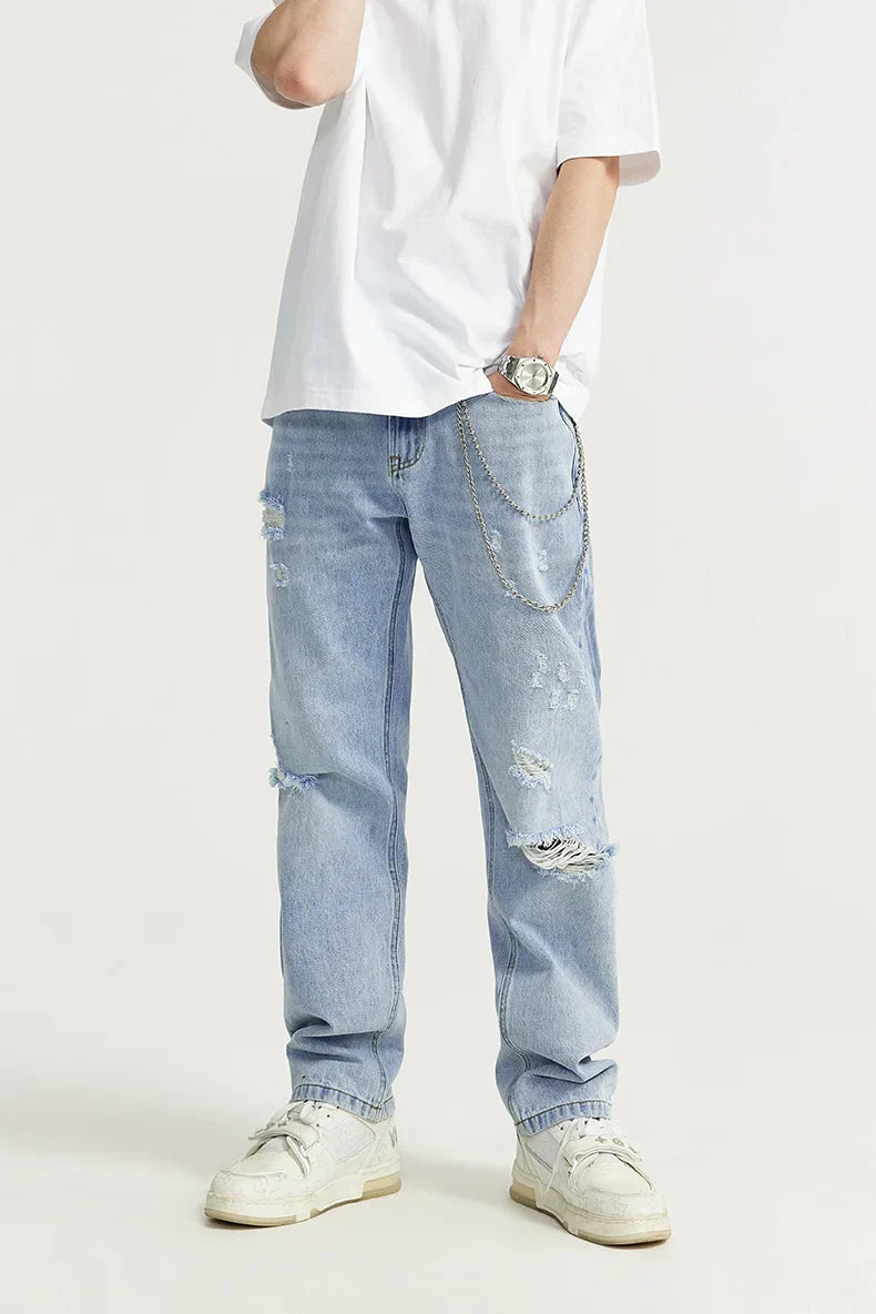 Przetarte jeansy slim fit