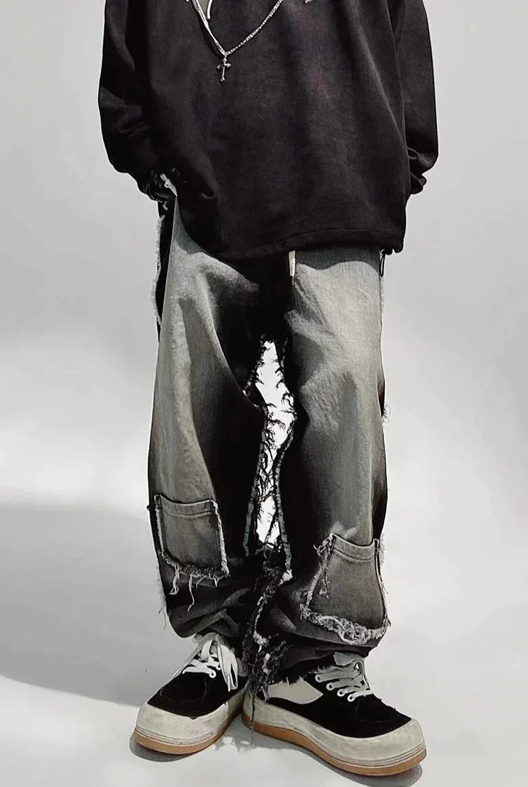 Czarne jeansy typu oversize z dziurami