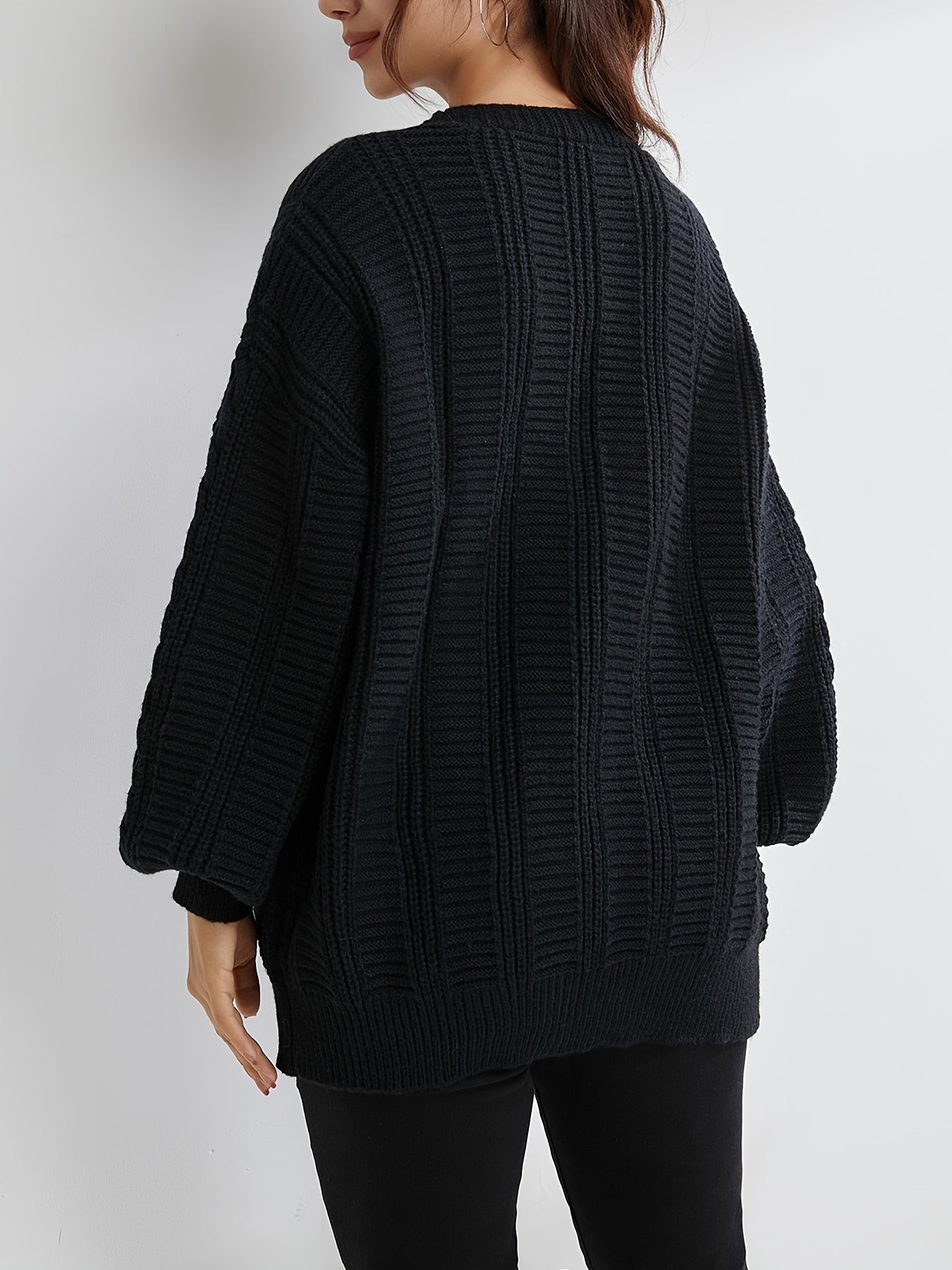 Czarny kardigan damski zapinany na guziki