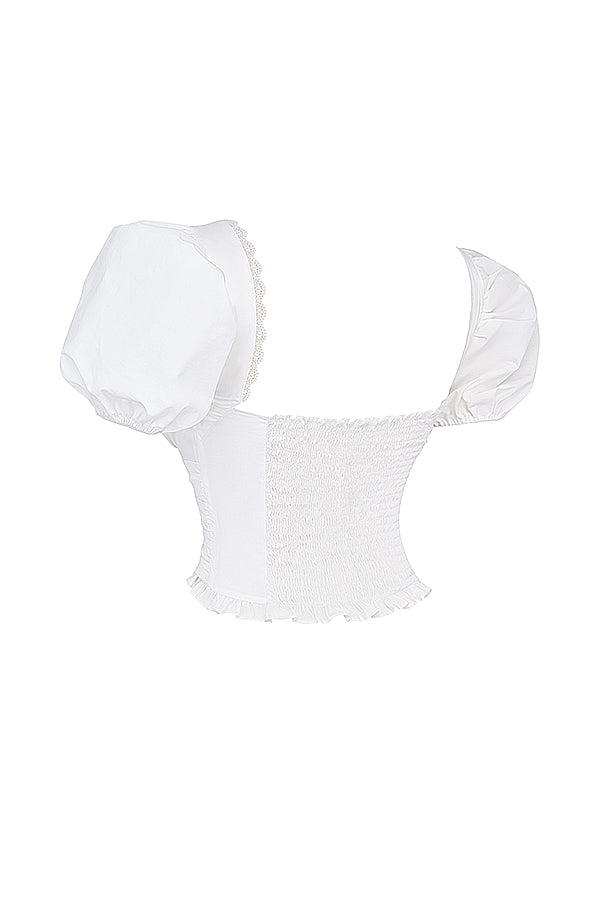 Biaęy plisowany top z plisowaną mini spódniczką Stone