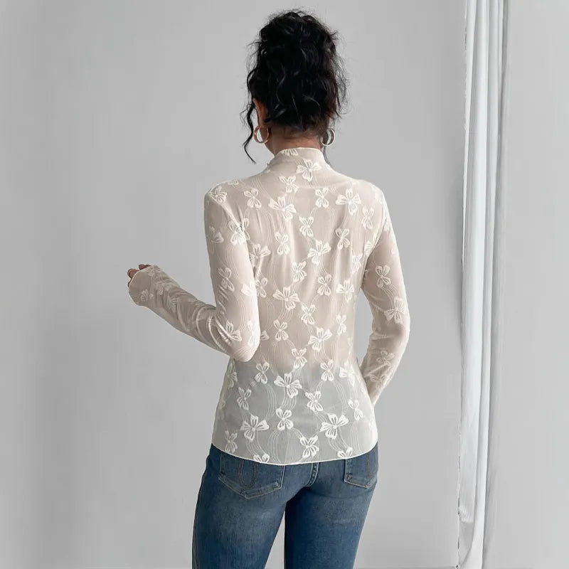 Top w kolorze beżowym z wzorem wstążki