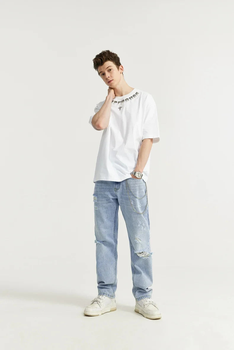 Przetarte jeansy slim fit