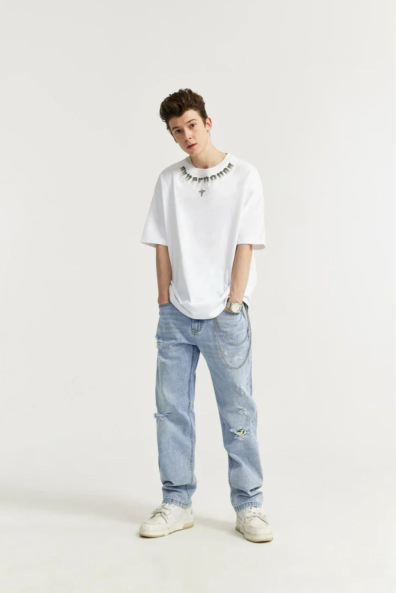 Przetarte jeansy slim fit