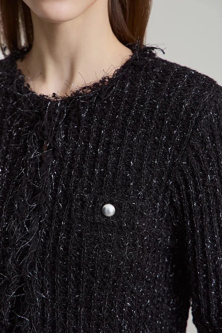 Minimalistyczny kardigan z frędzlami